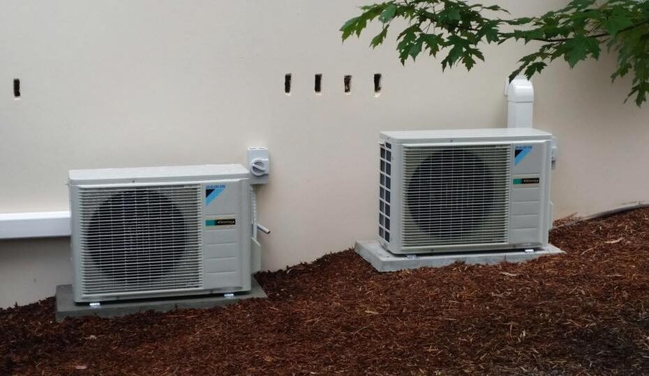 Outdoor air conditioning equipment installed beside a property